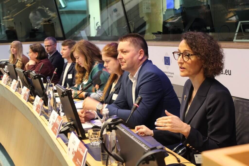 Tuba Bircan speaking from the panel table in a European Union meeting room